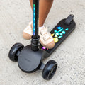 close up of light up stem on amber kick scooter