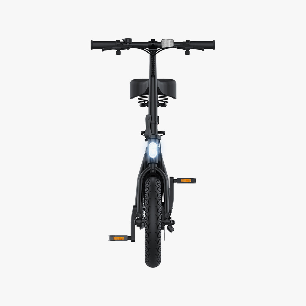 front view with headlight turned on on the atlas pro electric bike
