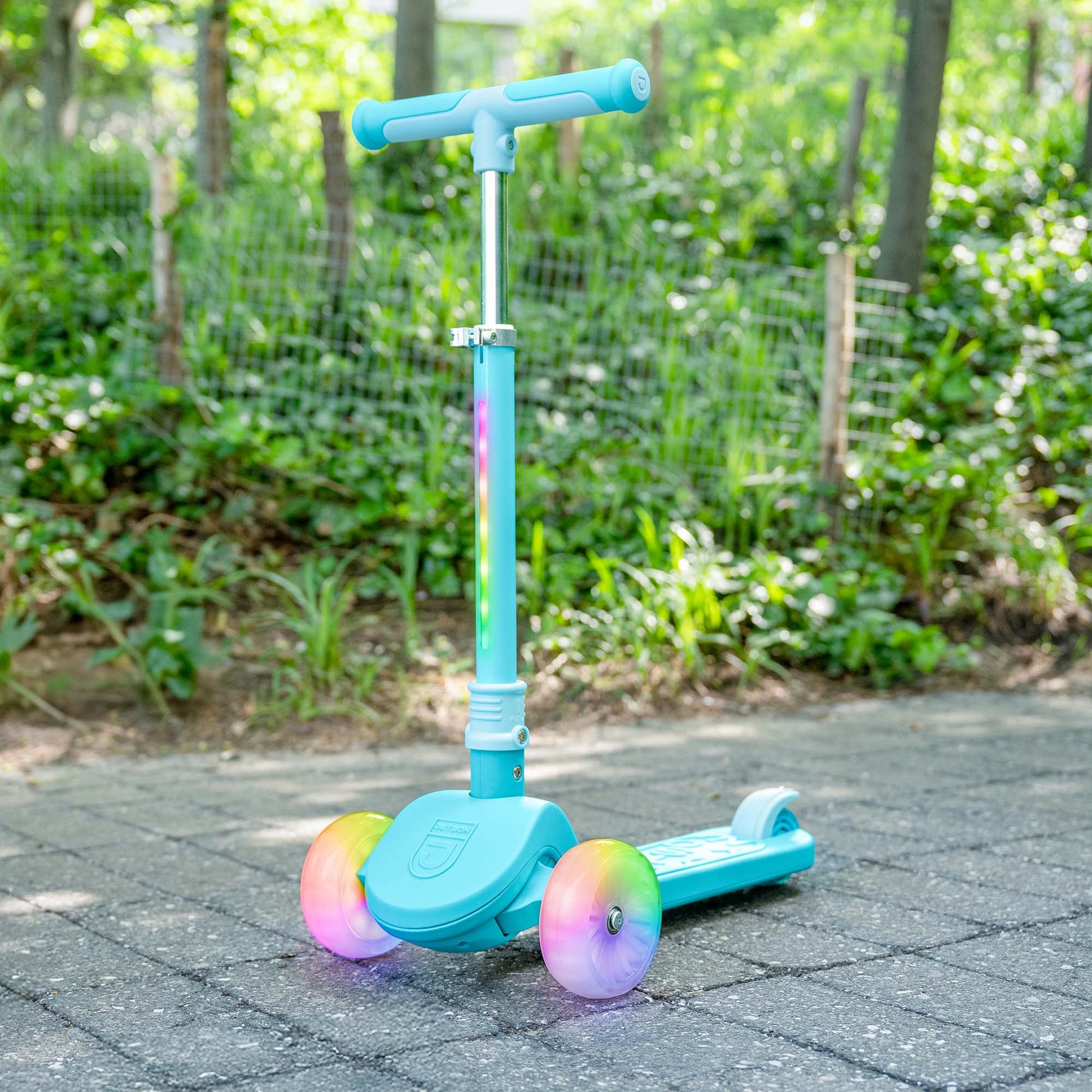 blue light up bloom kick scooter in the park