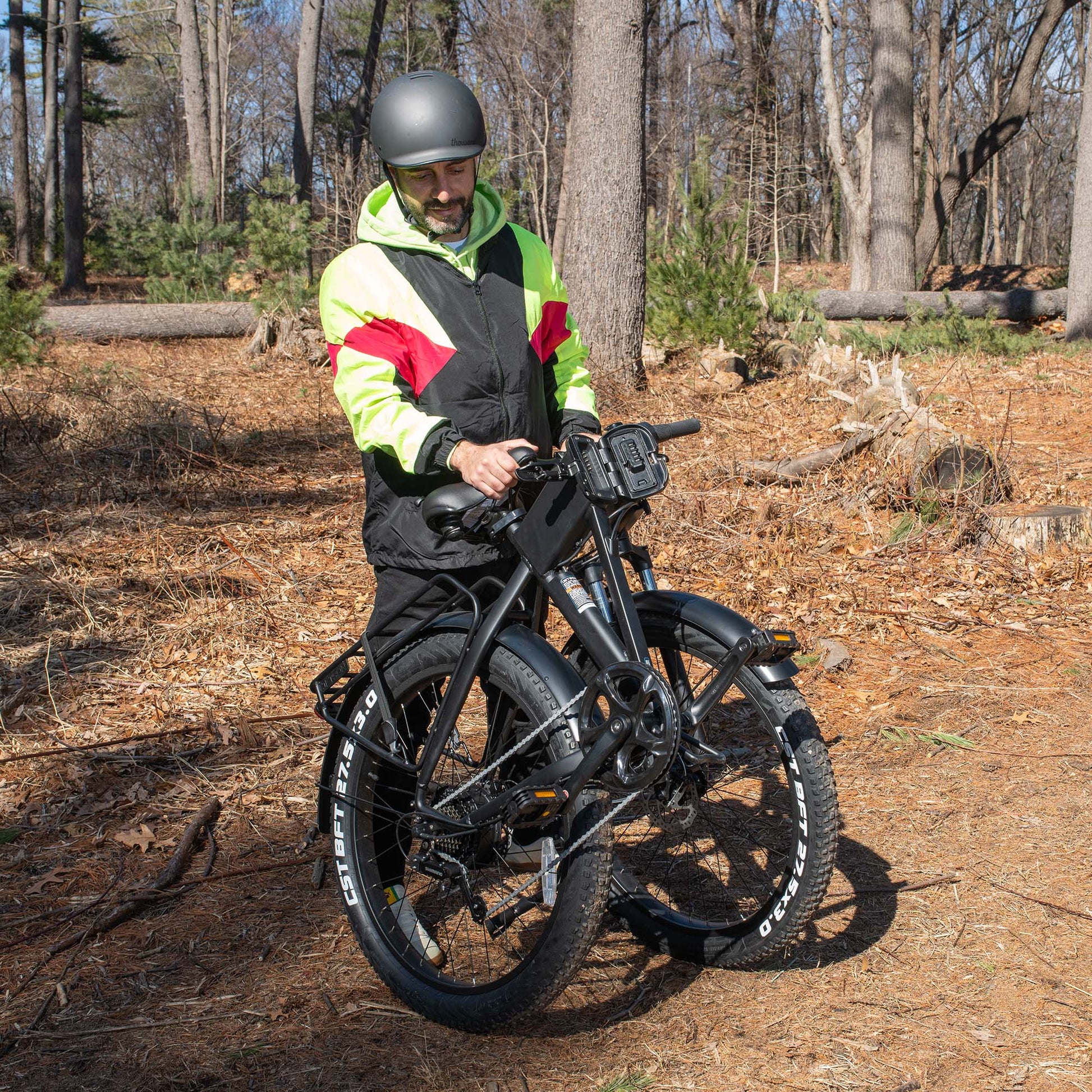 man folding core e-bike