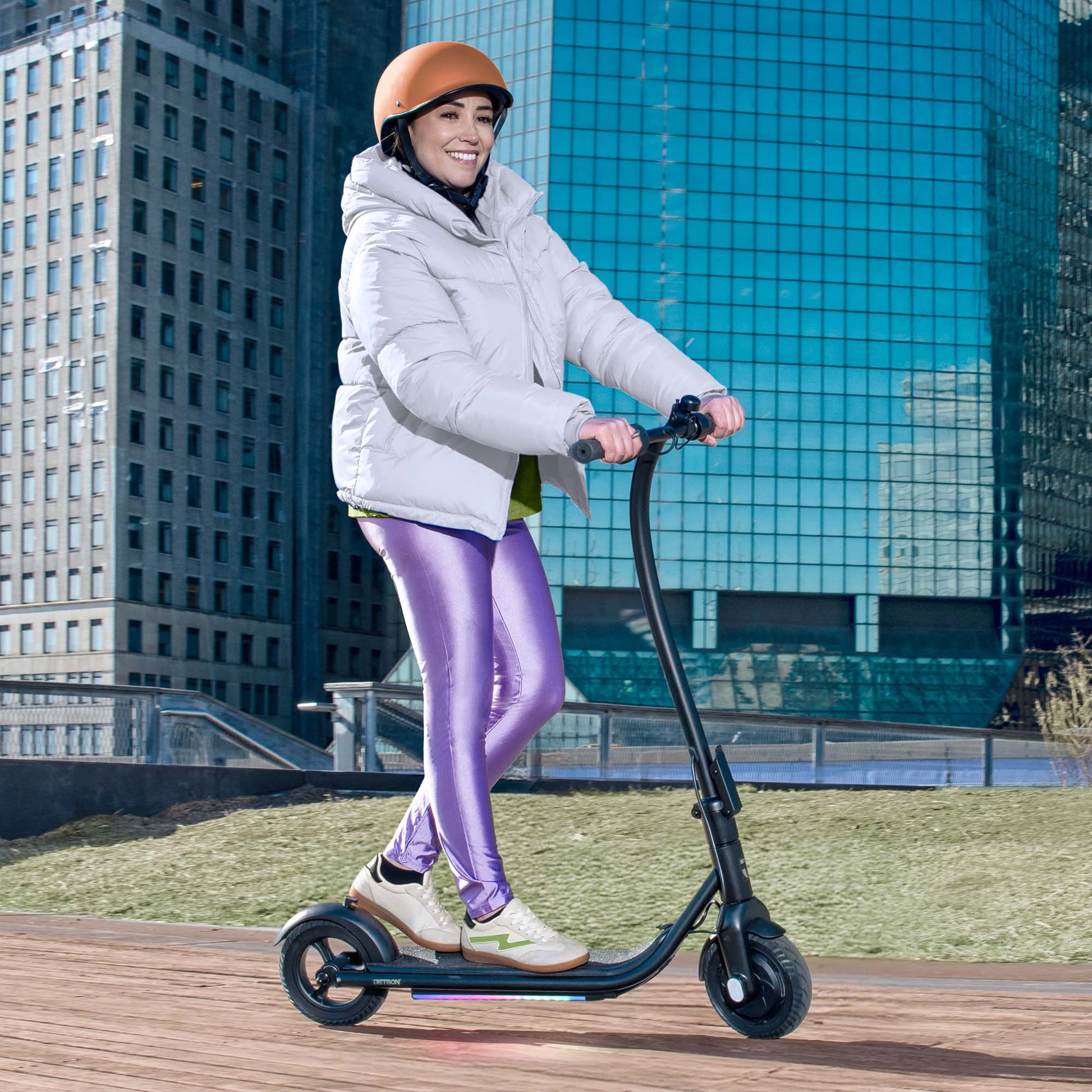person riding ember e-scooter