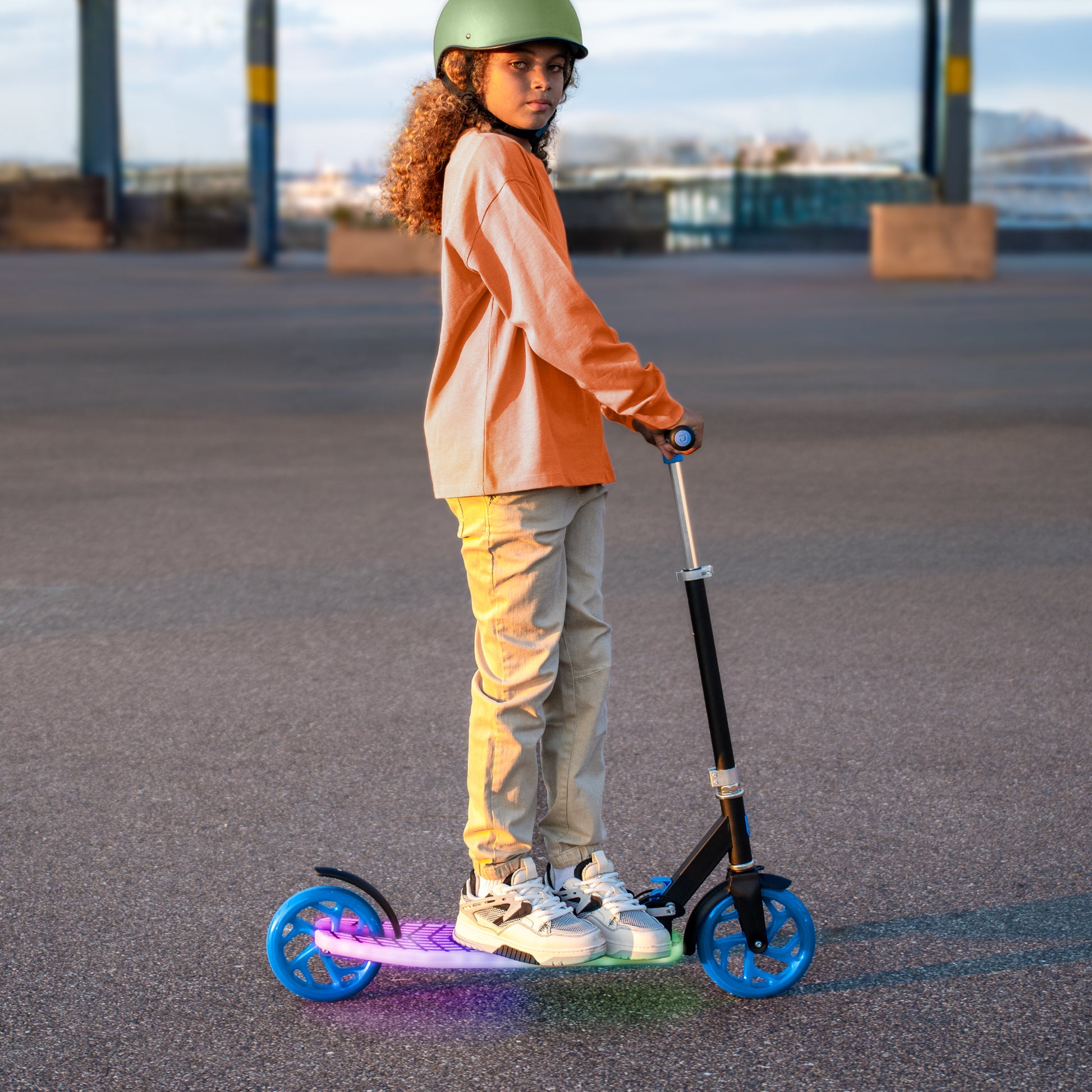 kid standing on J-Ray kick scooter