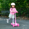 little kid riding pink leap kick scooter in park
