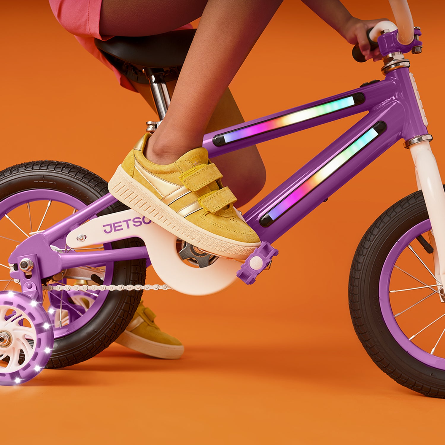 close up of light up frame on purple bike