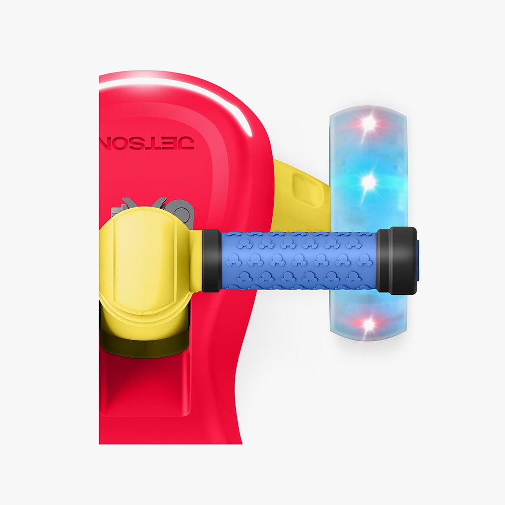 close up of handlebar grips on mickey mouse kick scooter
