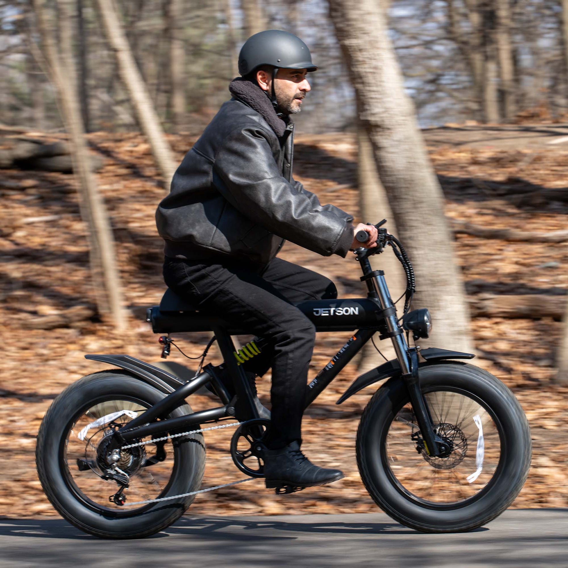person riding otto electric bike in the woods