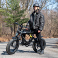 person sitting on otto electric bike