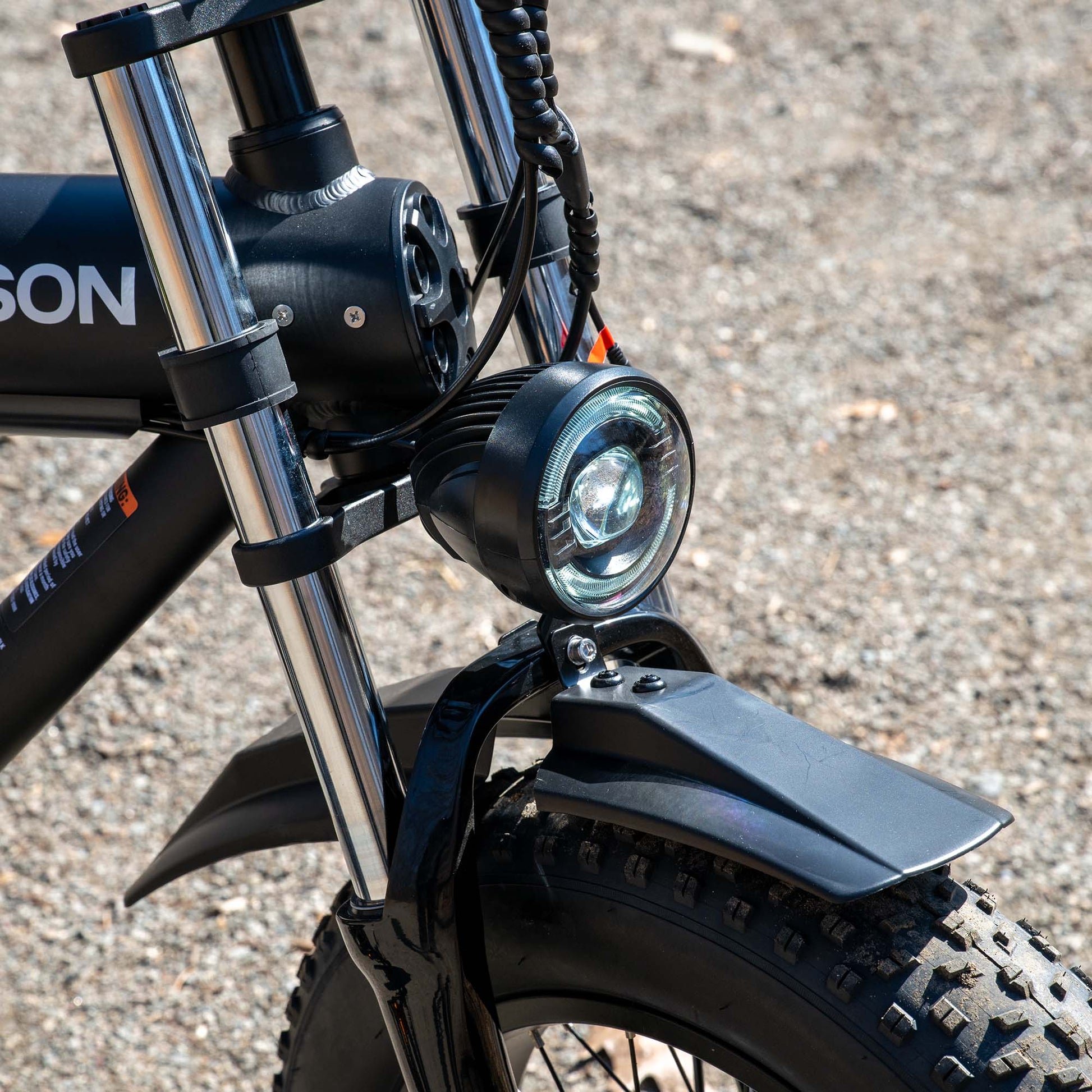 close up of front headlight on otto electric bike