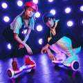 two people in helmets riding the pixel hoverboards