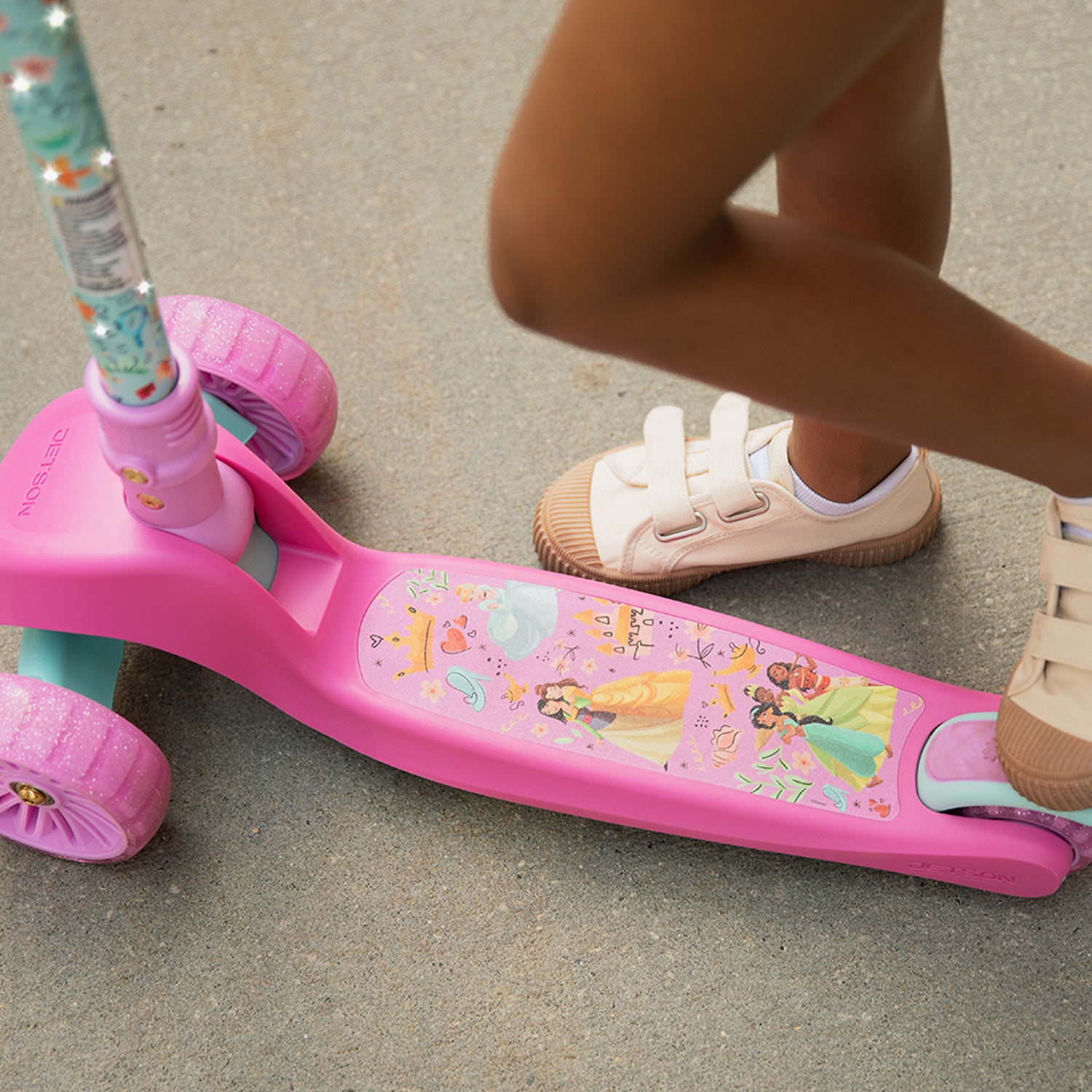 close up of the scooter deck featuring Disney princesses
