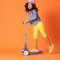 child riding the light up sonic scooter version 1