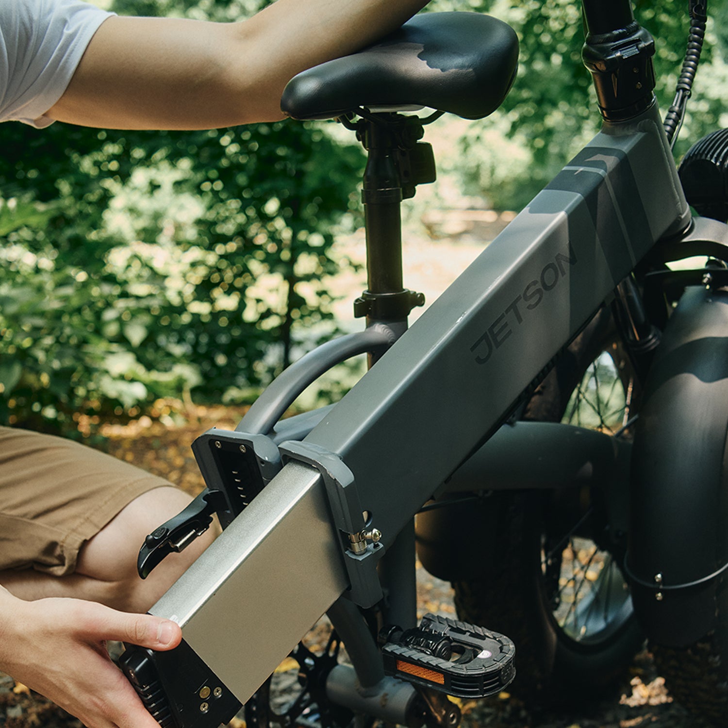 close up of battery being inserted into warren electric bike