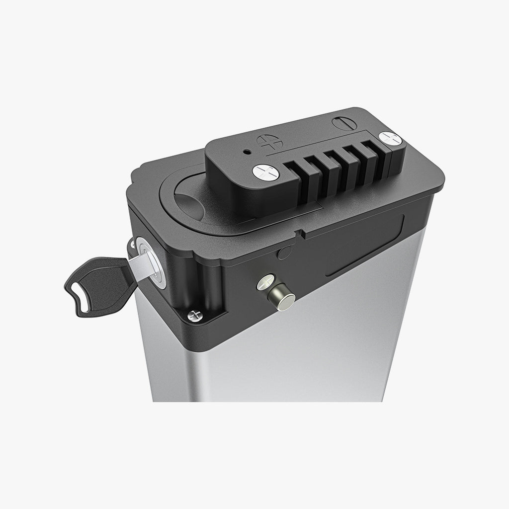 close up of key inserted into removable warren electric bike battery