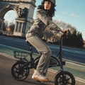 woman riding the Bolt Pro bike in the city