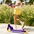 girl walking next to the disney encanto kick scooter
