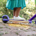 close up of the light up deck on the disney encanto electric scooter
