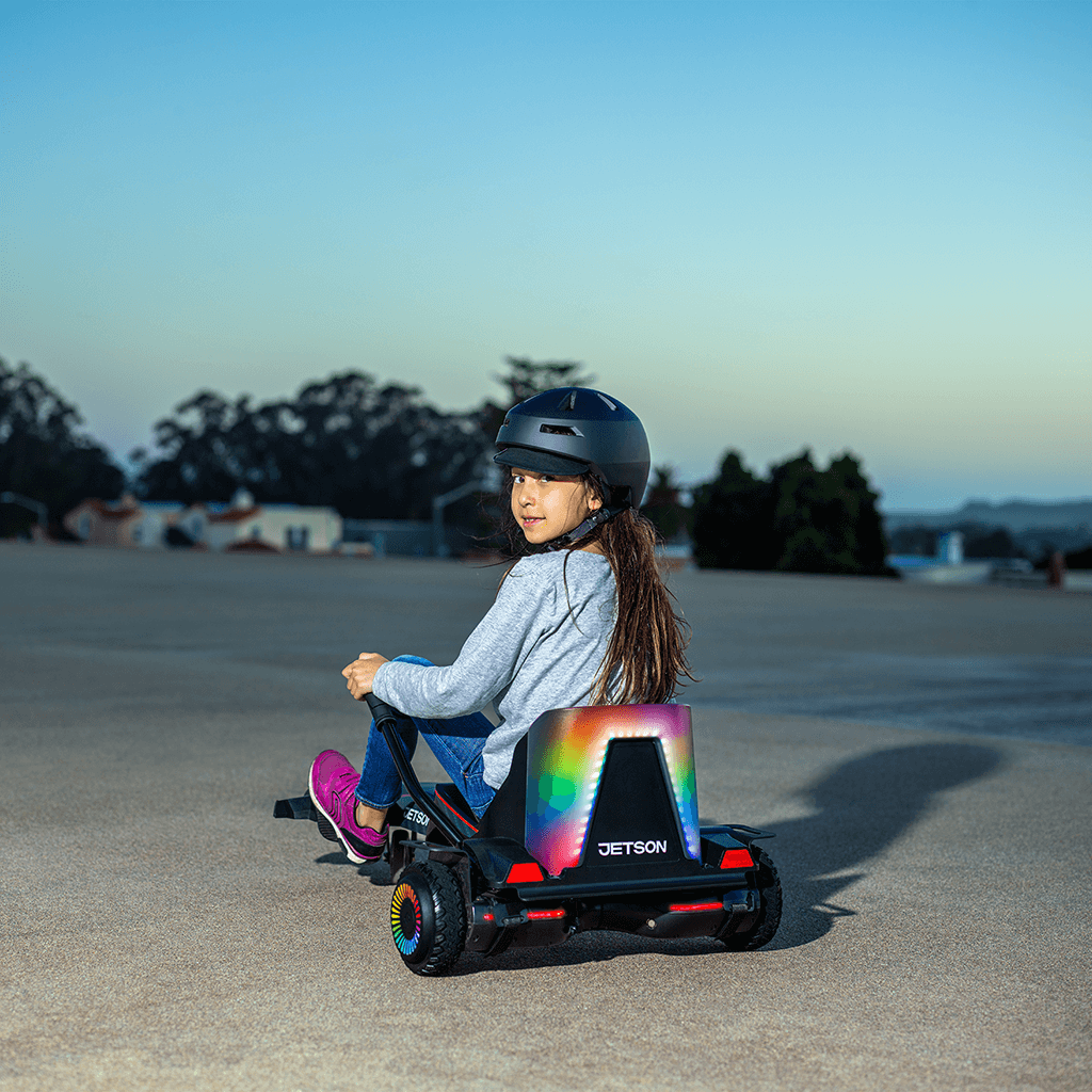 kid riding the force hoverboard combo looking back over their shoulder