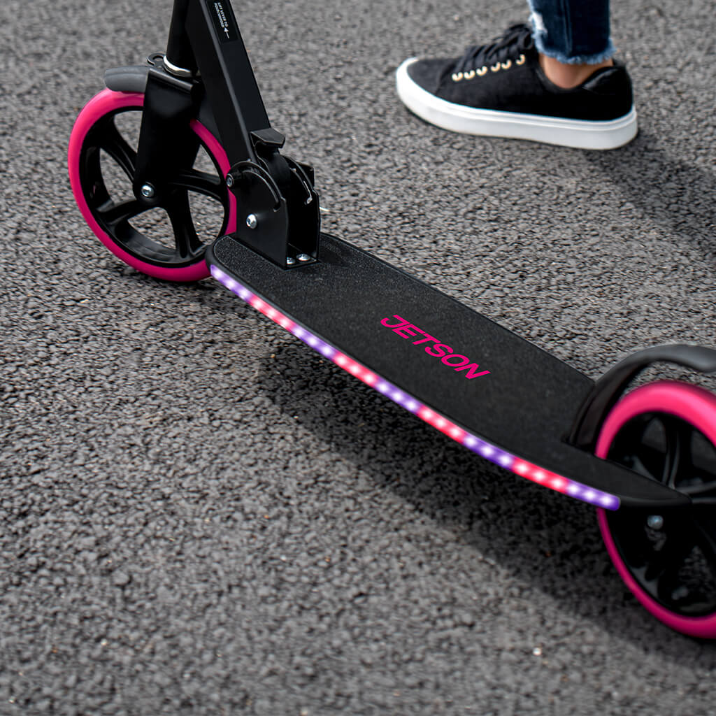 close up of light up deck on pink helix scooter