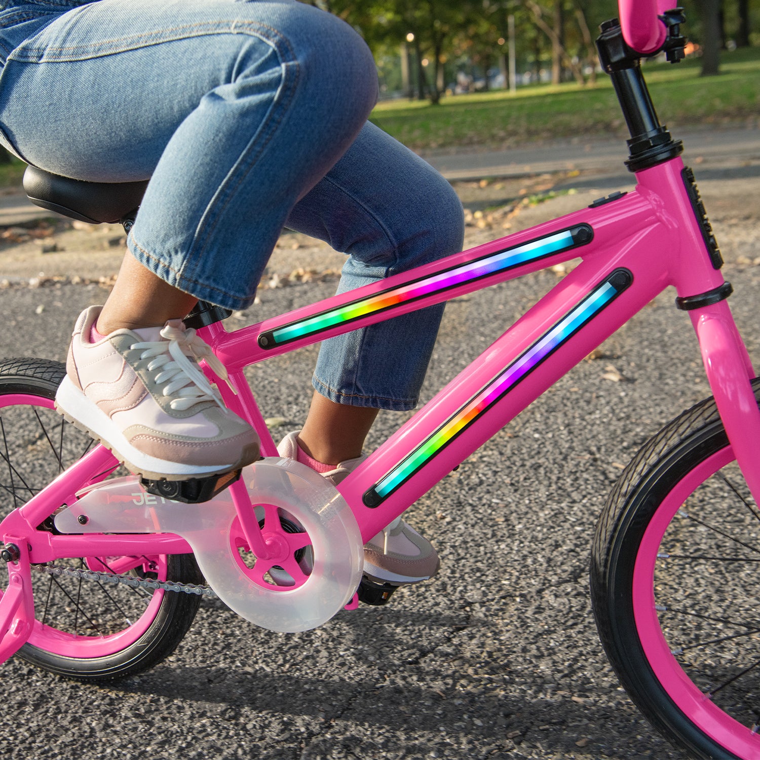 close up of lights on pink light rider 16 bike