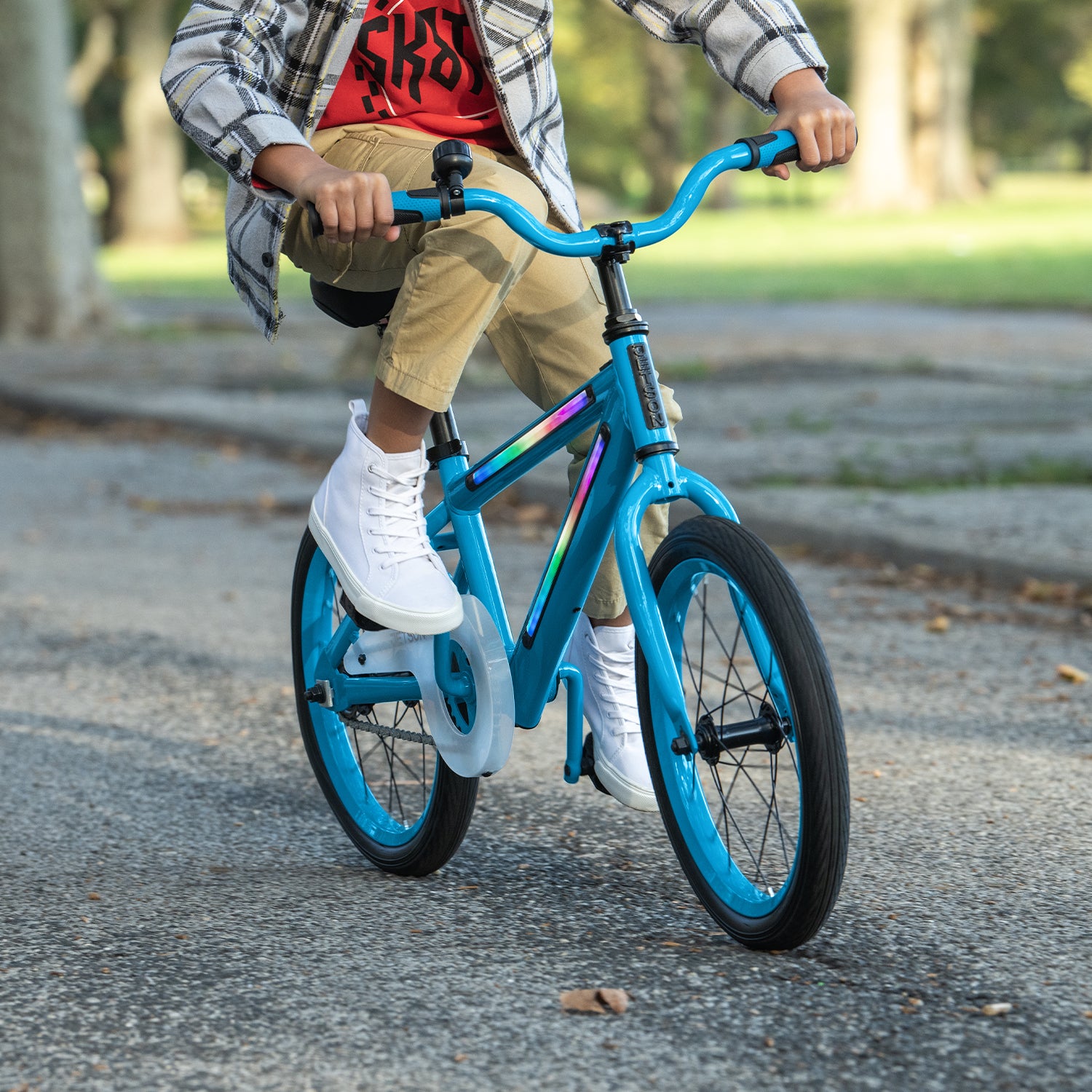 blue light rider 16 bike with the lights powered on