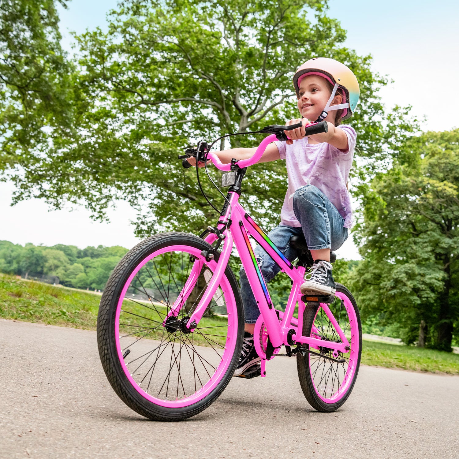 little girl riding the pink JLR X