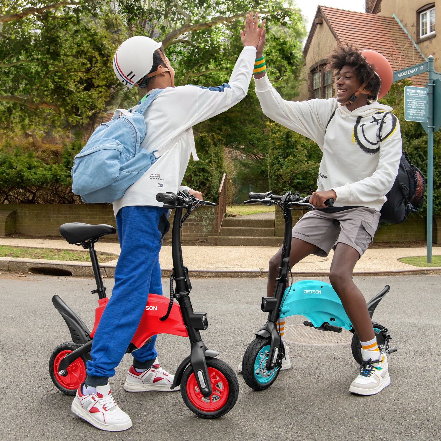 two people high fiving each other while riding their LX10s