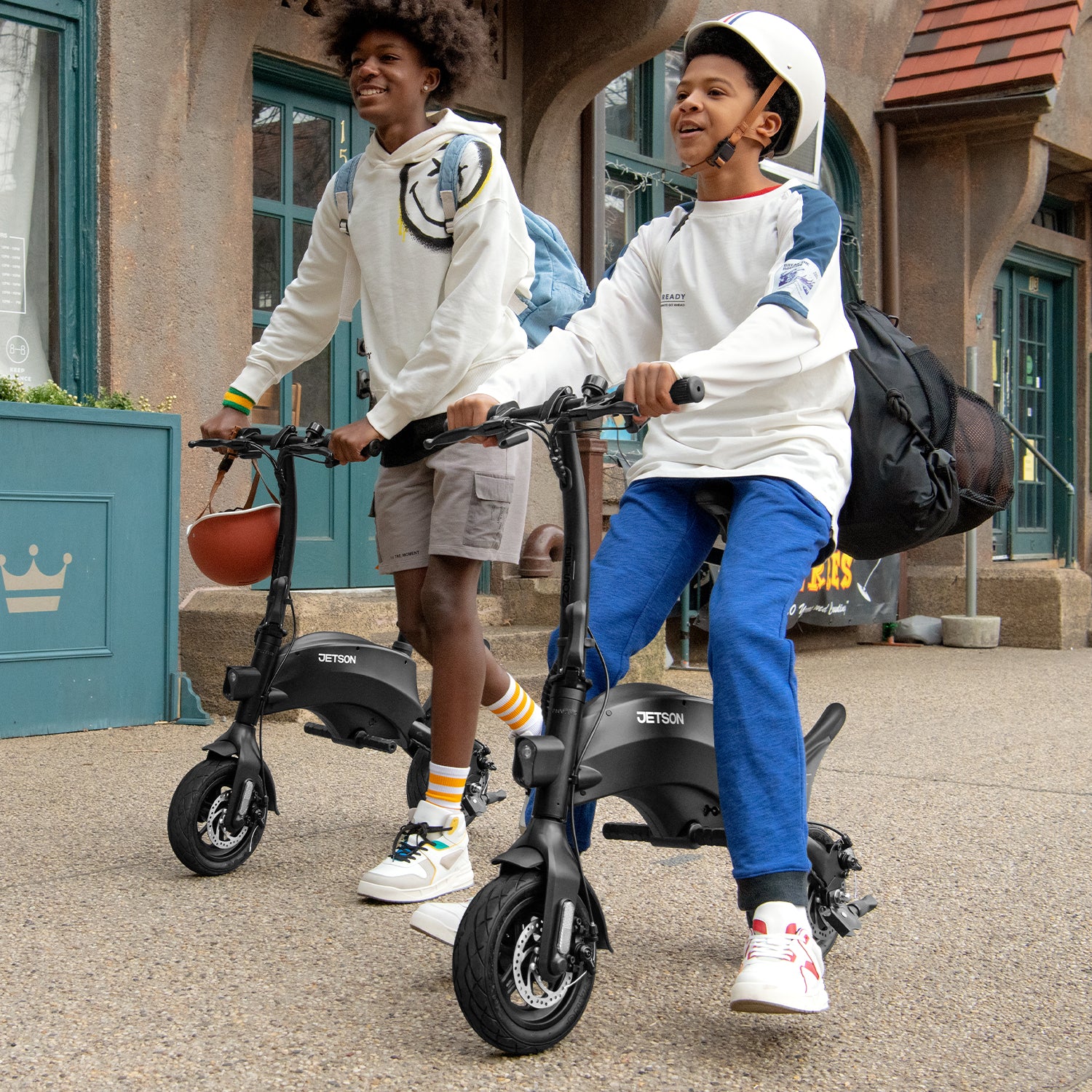 two people riding and pushing their LX10s outside