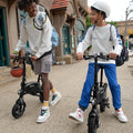 two people pushing and riding their LX10s