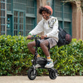 person riding the black LX10