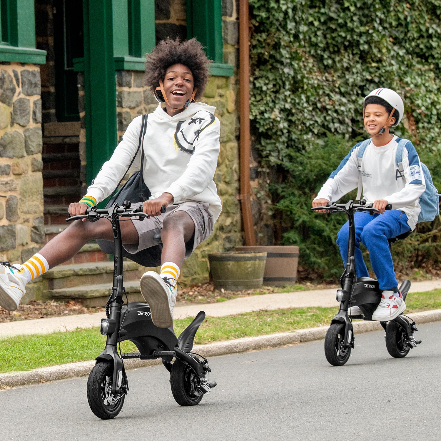 two people riding their LX10 and one of the people has his legs up