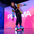 kid riding plasma hoverboard