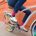 close up of person's feet on the Zephyr bike pedals