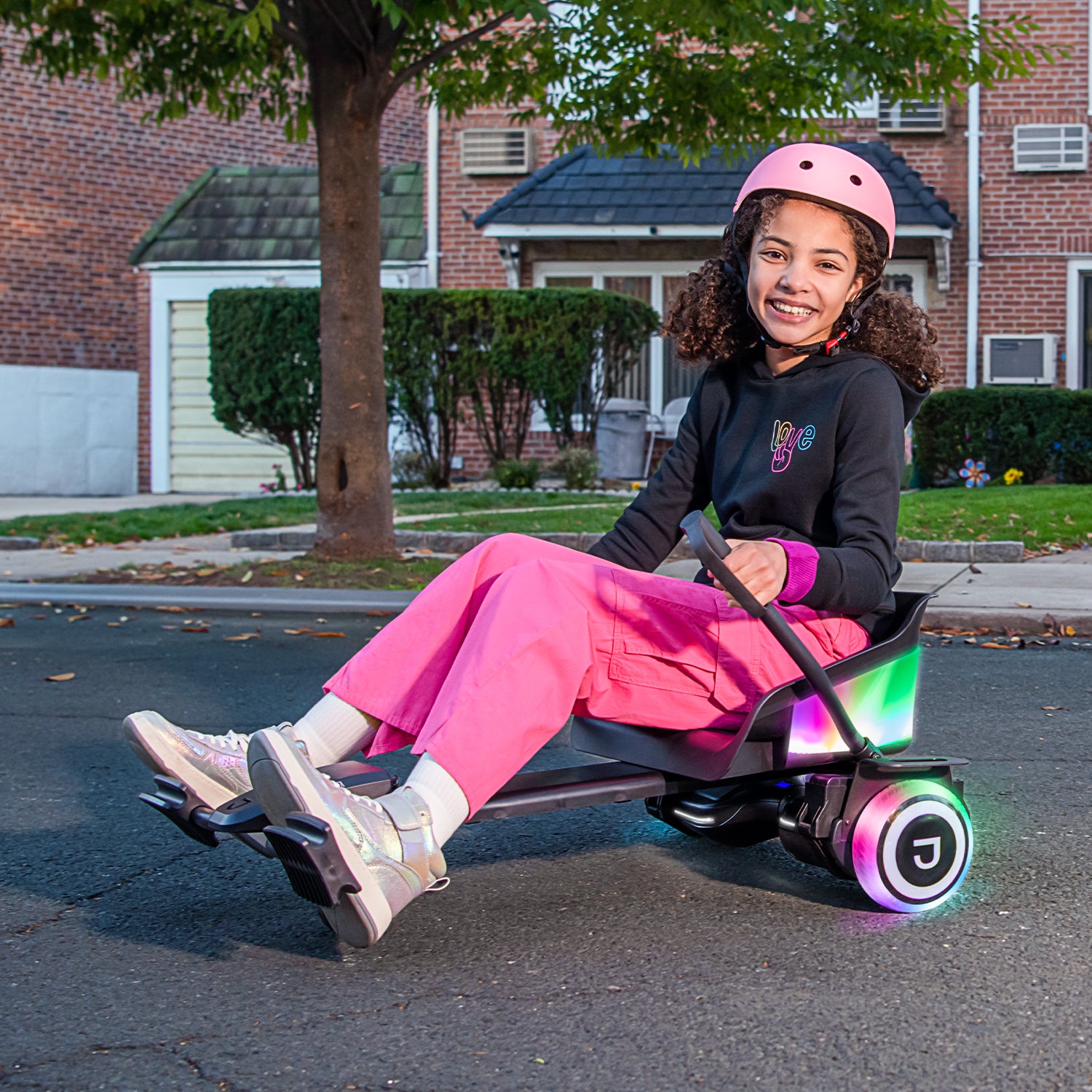 girl sitting on light up remix jetkart combo