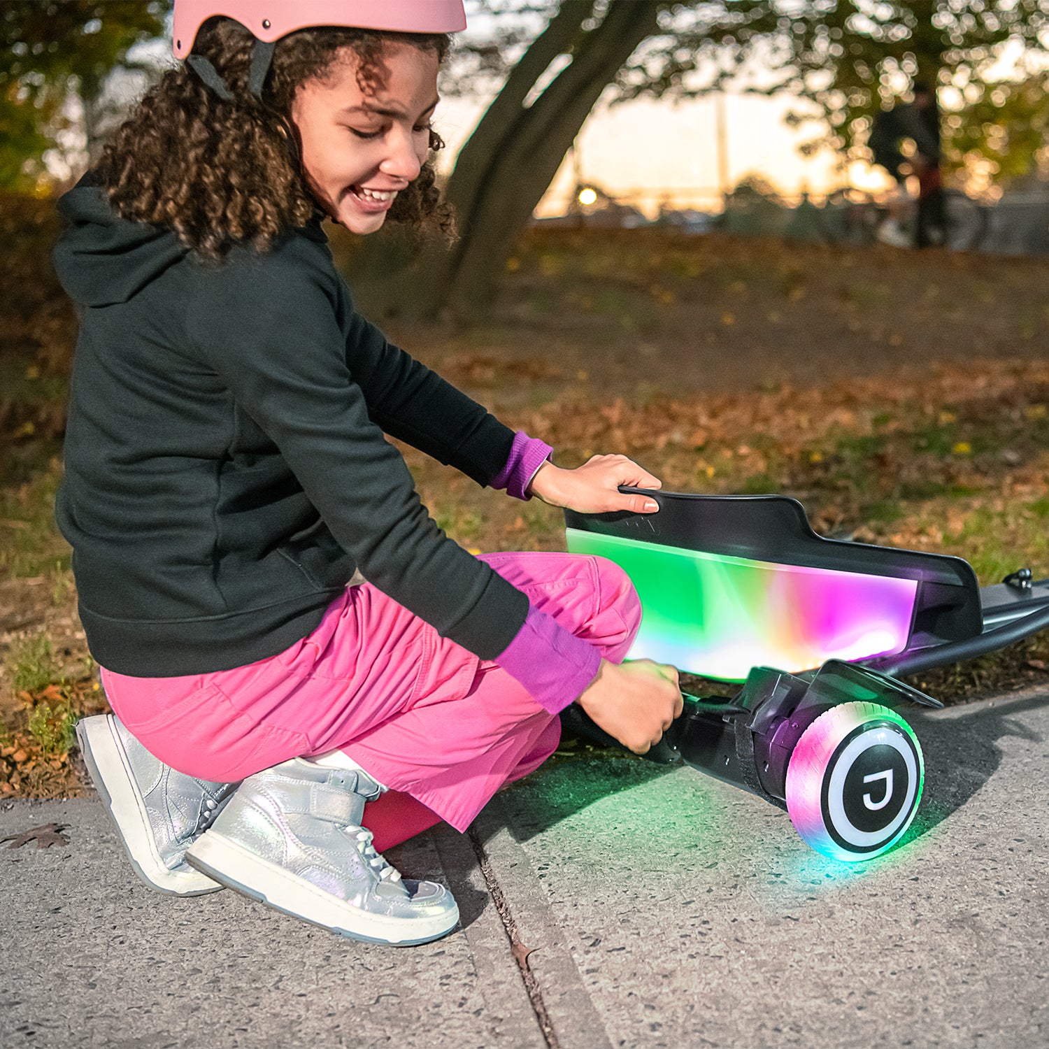 girl adjusting velcro straps on remix jetkart combo