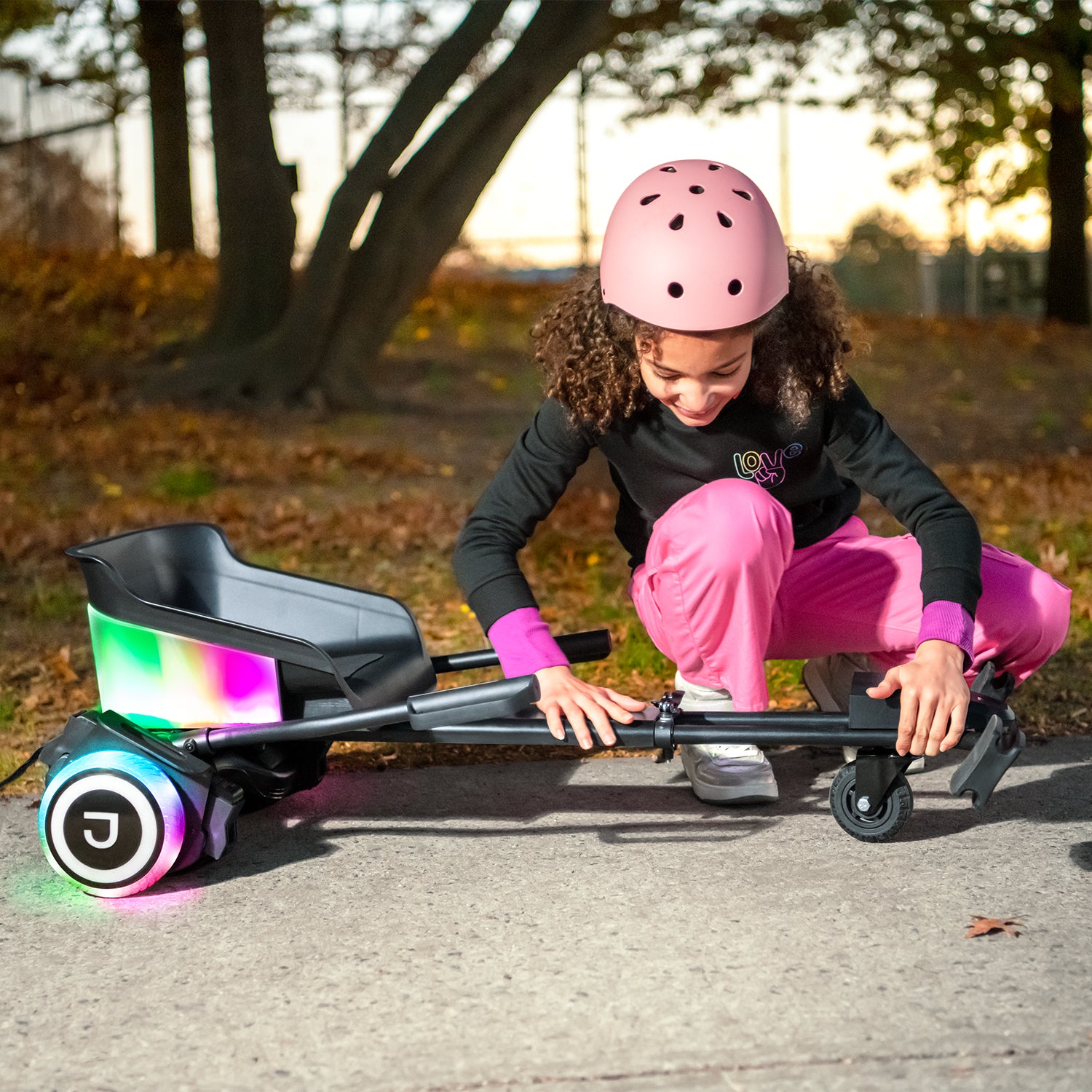 girl adjusting the length of footrest on remix jetkart combo