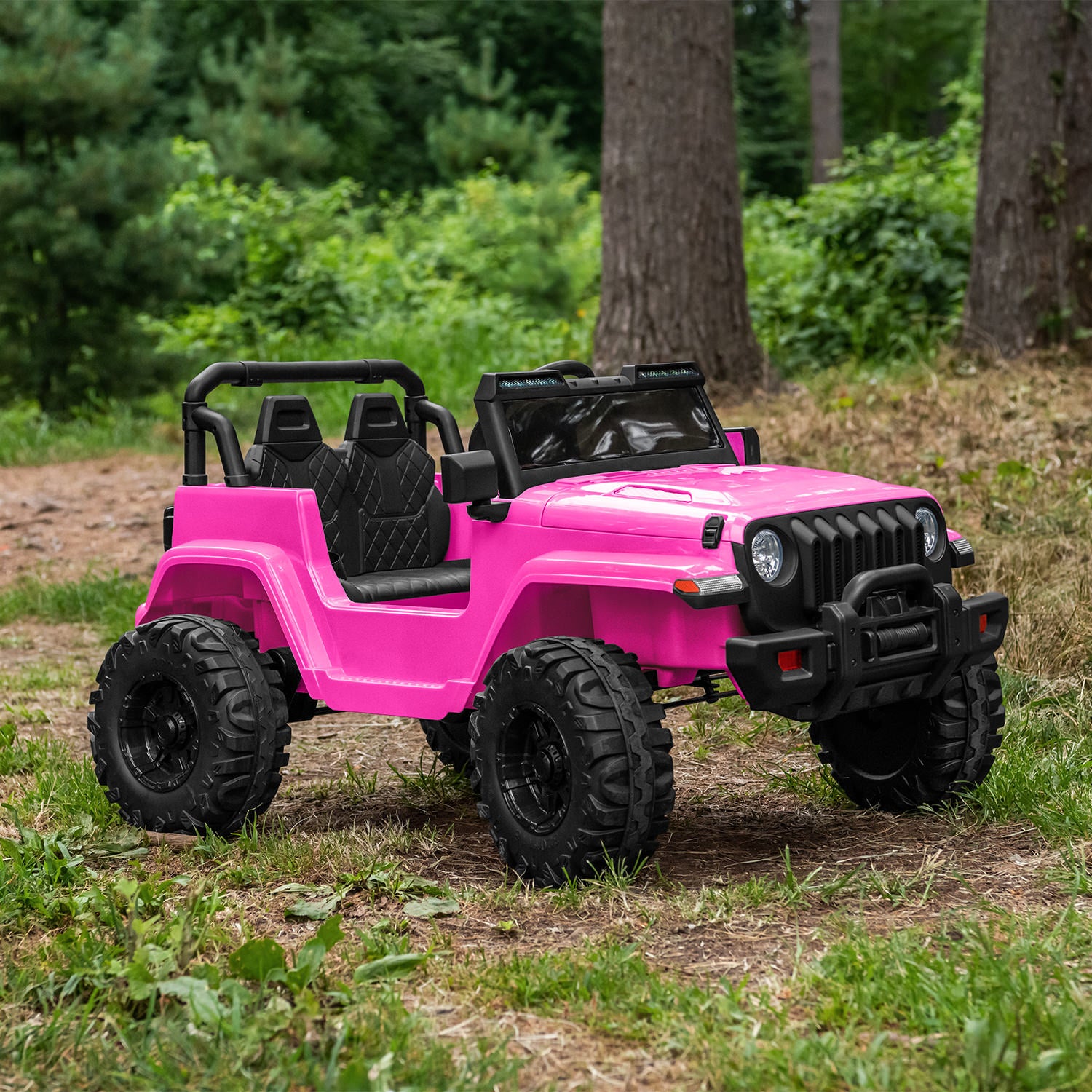pink safara ride-on parked on a lawn