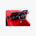 close up of steering wheel on red safara ride-on