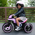 young child sitting on the purple Trooper Electric Ride On