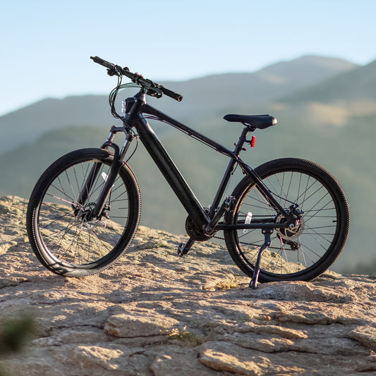 black adventure bike posed on a rock