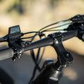 close up of the handlebar and display on the adventure bike