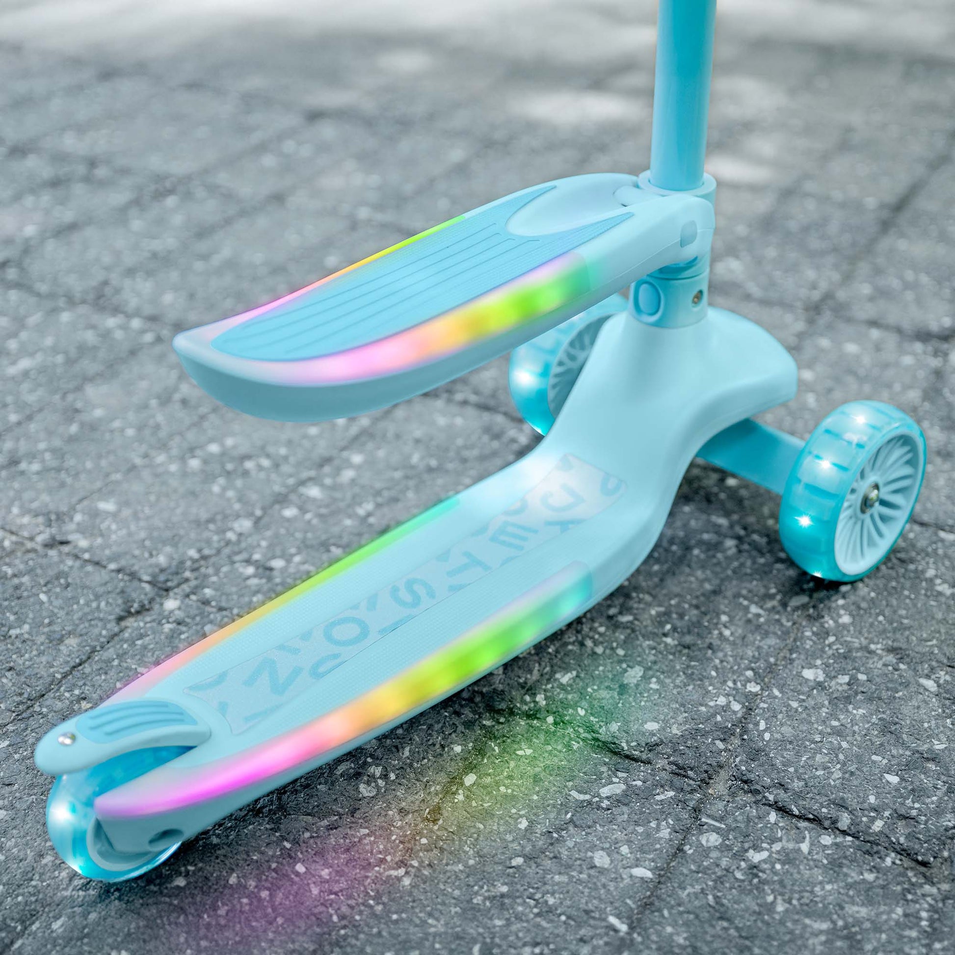 close up of colorful lights on aria kick scooter