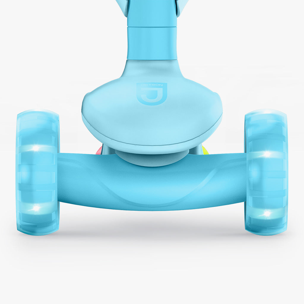 close up of front wheels on aria kick scooter