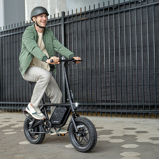 man riding atlas pro electric bike