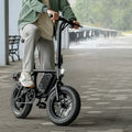 person riding atlas pro electric bike