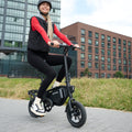 woman riding bolt pro x electric bike