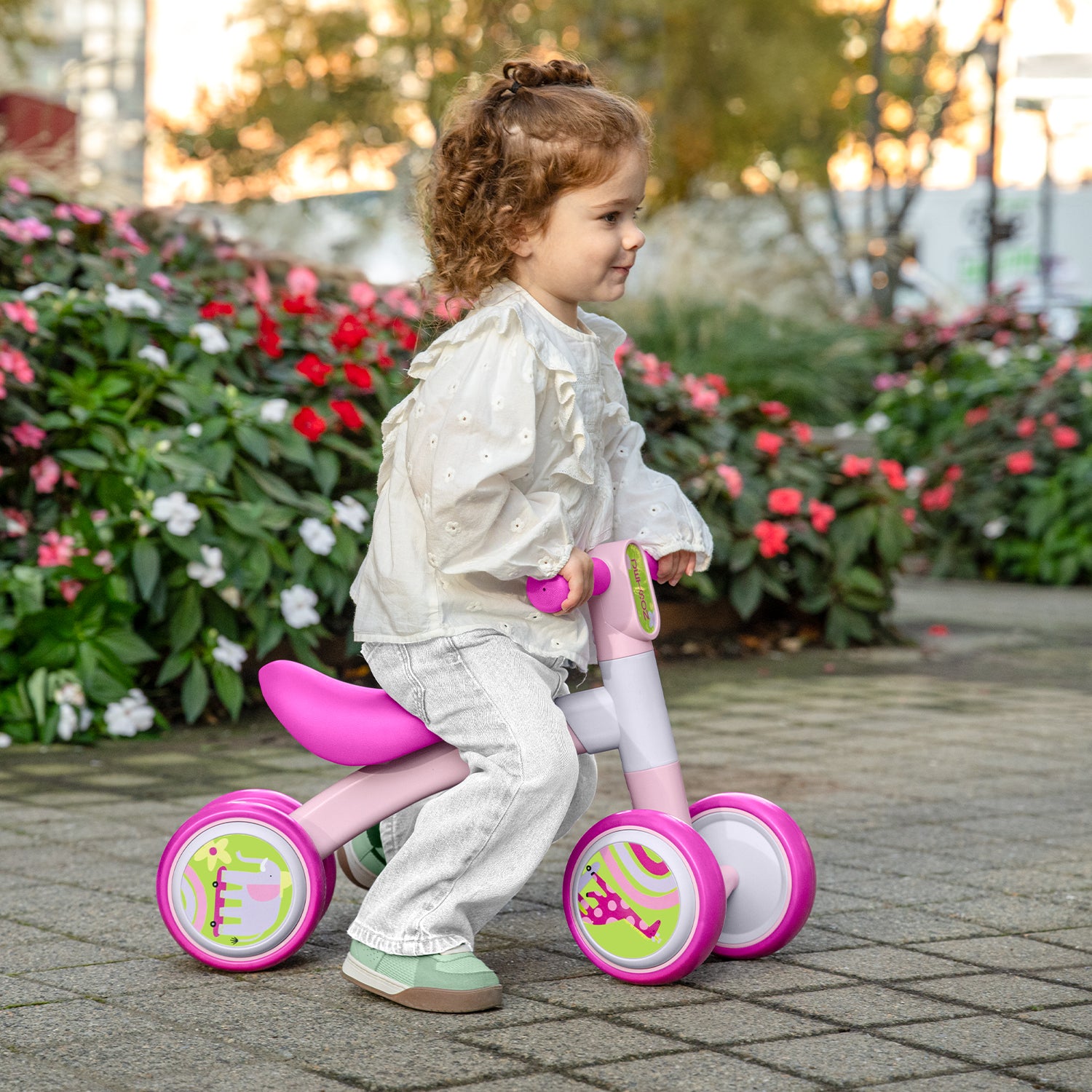 girl riding bounce balance bike