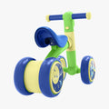 close up of rear wheel on green and blue bounce balance bike