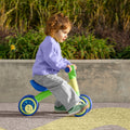 little kid riding bounce balance bike