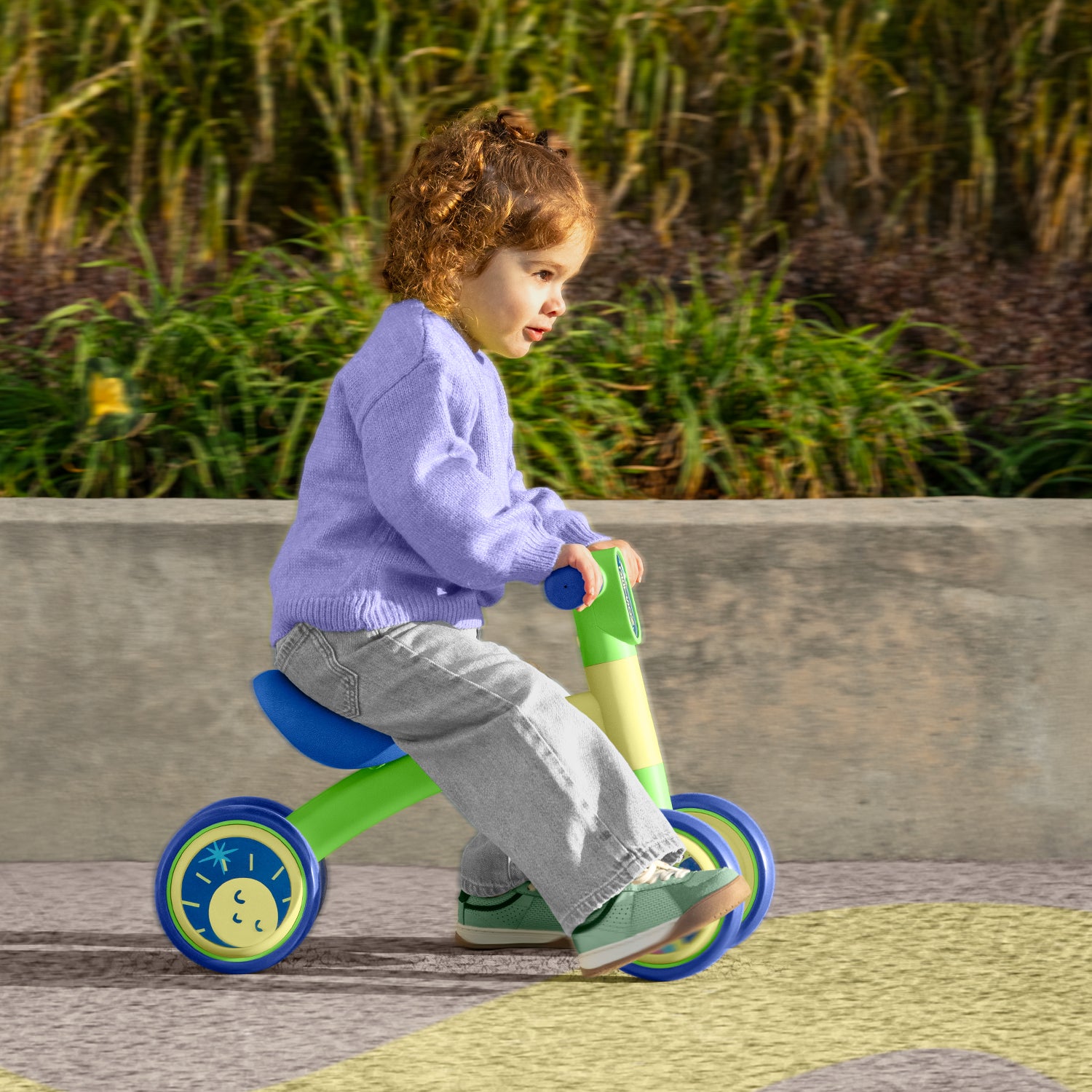 little kid riding bounce balance bike