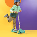 young kid riding the grogu customizable scooter